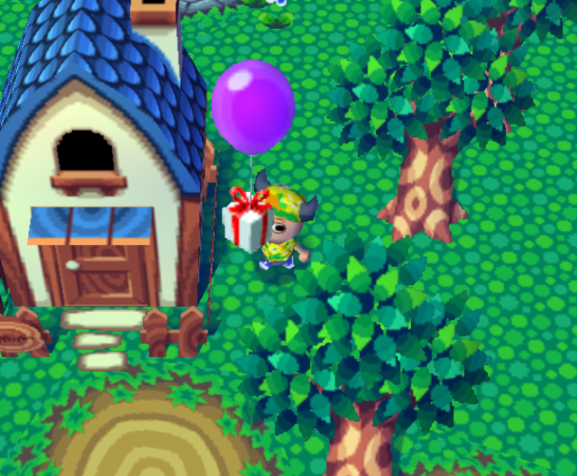 A present tied to a balloon floats overhead.